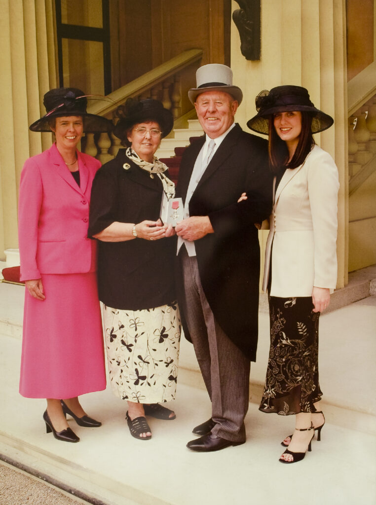 Image of Eddie Topping with an MBE.
